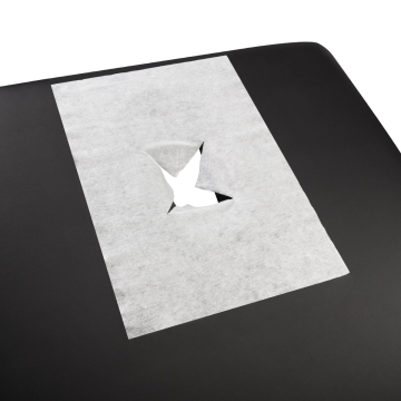 Disposable white breathing space cover with center slit on black surface