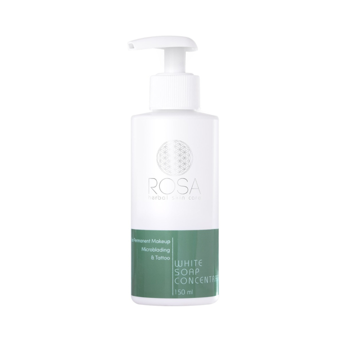Un flacon pompe blanc étiqueté « Rosa – Concentré de savon blanc aux herbes 150 ml » avec des accents verts, pour une utilisation dans le maquillage permanent, le microblading et le soin des tatouages.